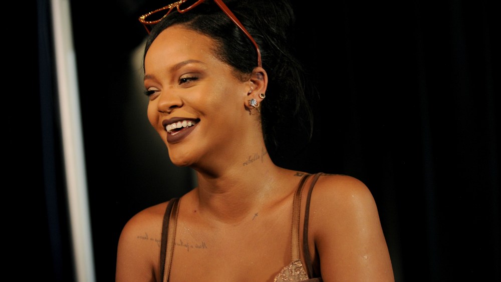 Rihanna talks to media backstage after Savage X Fenty fashions are shown in a performance at the Brooklyn Navy Yard at the end of Fashion Week, in the Brooklyn borough of New York. Rihanna unleashed the wild beast in a lush tropical land to debut her second season of Savage x Fenty lingerie and loungewearFashion Rihanna Savage X Fenty, New York, USA - 12 Sep 2018