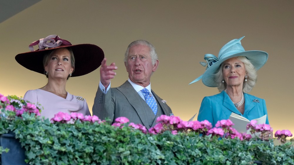 Britain's Prince Charles, Camilla, Duchess of Cornwall and Sophie, Countess of Wessex, left, take their place in the stands on day one of the Royal Ascot horse racing meeting, at Ascot Racecourse, in Ascot, England, Tuesday June 14, 2022. (AP Photo/Alastair Grant)