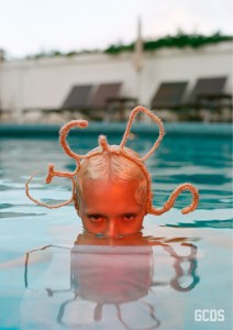 An endless summer state of mind inspired GCDSÕ fall 2019 ad campaign lensed by New York-based photographer Renell Medrano. The brandÕs creative director Giuliano Calza invited a group of friends of the house, including models Alton Mason, Jazzelle Zanaughtti, Teddy Quinlivan and Sasha Trautvein, to Capri, Italy, where they were captured against the backdrop of a luxurious villa overlooking the island. In keeping with the labelÕs playful and ironic attitude, a picture fronted by Zanaughtti sees the model plunging in a swimming pool and donning a GCDSÕ logo-shaped hairdo. Inspired by vintage postcards, each image bears phrases such as ÒWish you were hereÓ and ÒBaci from Capri.Ó Ñ Martino Carrera