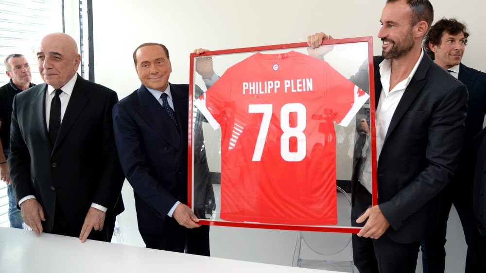 Philipp Plein and former Prime Minister Silvio Berlusconi during press conference