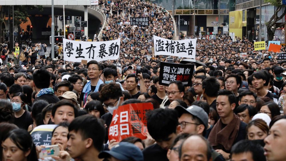 Protesters attend a rally on July 7 in Tsim Sha Tsui. The city has endured a month of protests and this most recent march moved to target Mainland Chinese hotspots.