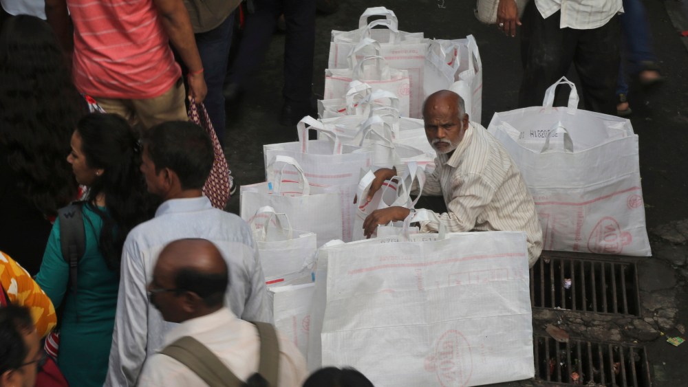 A street vendor wait to sell bags outside a railway station in Mumbai, India . Indian Prime Minister Narendra Modi's government has proposed to invest heavily in infrastructure, digital economy and job creation to lift a slugging economy that's burdened with a 45-year-high unemployment rate of 6.1 percentEconomy, Mumbai, India - 05 Jul 2019