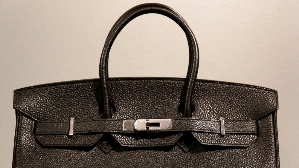 Acounterfeit Hermes Berkin luxury handbag shown during a press preview of "Treasures on Trial: The Art and Science of Detecting Fakes" at the Winterthur Museum in Wilmington, Del.