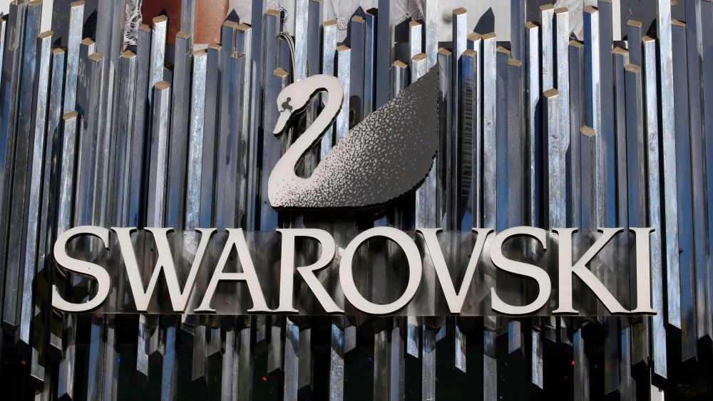 The logo of "Swarovski", Austrian producer of crystal Business, that primarily produces crystal jewelry and accessories and optical instruments such as telescopes and binoculars is pictured on the Champs Elysees Avenue in Paris, FranceSwarovski, Paris, France - 20 Sep 2017