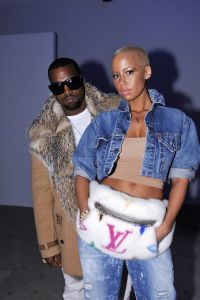 Kanye West (L) and Amber Rose backstage at Dunhill's fall 2010 menswear runway show at Palais de Tokyo.Dunhill Fall 2010 Menswear, Paris
