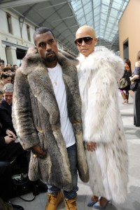 Rapper Kanye West (L) and Amber Rose attend Louis Vuitton's fall 2010 menswear runway show.Louis Vuitton Fall 2010 Menswear, Paris
