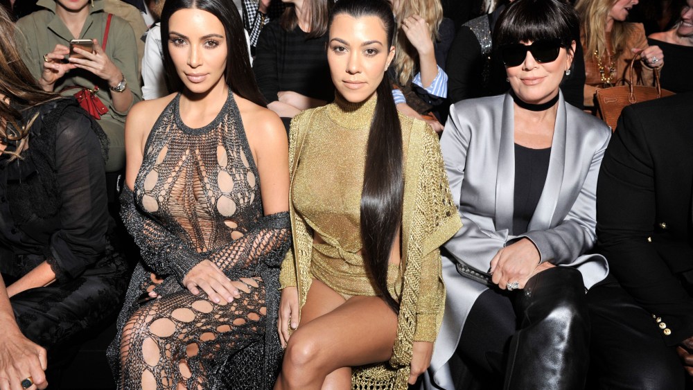 Kim Kardashian, Kourtney Kardashian and Kris Jenner in the front row
