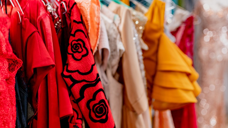 dresses hanging on a clothing rack