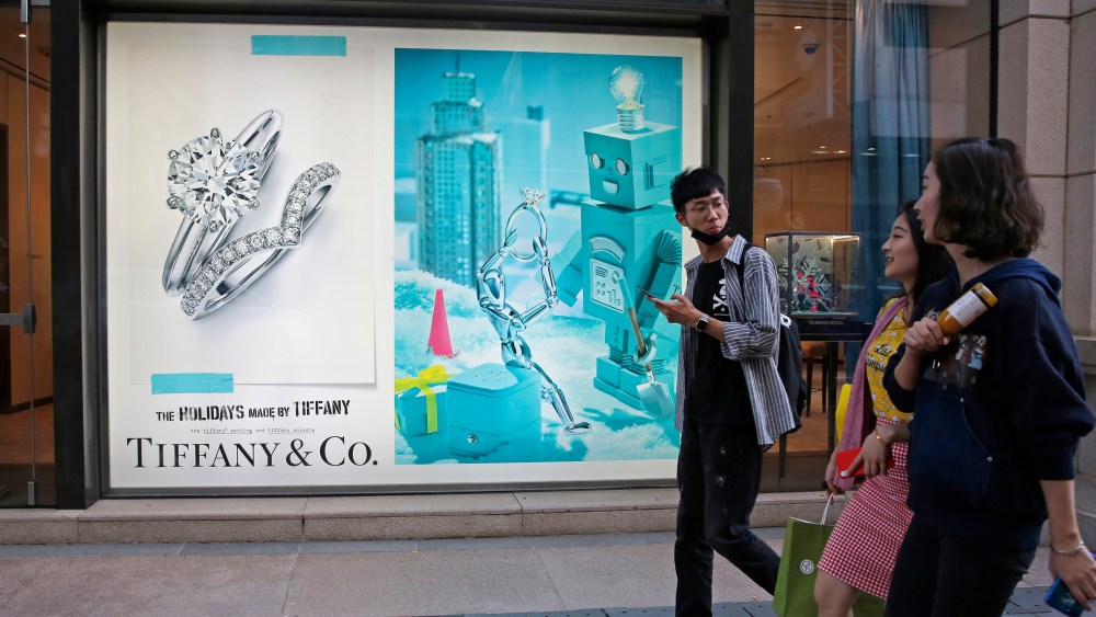 Chinese tourists walk past a Tiffany & Co. flagship in Canton Road, the one-stop-shop high street of high-end brands in Hong Kong. The designer boutiques of Manhattan and Paris are feeling the chill of a Chinese economic slowdown that has hammered automakers and other industries. That is jolting brands such as Louis Vuitton and Burberry that increasingly rely on Chinese customers who spend $90 billion a year on jewelry, clothes and other high-end goods. The industry already is facing pressure to keep up as China's big spenders shift to buying more at the spreading networks of luxury outlets in their own countryChina Luxury Shopping Chill, Hong Kong, Hong Kong - 29 Nov 2018