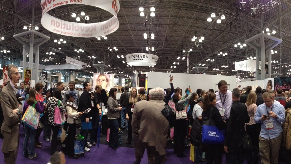 Vision Expo West 2019 featuring a crowd of people on the trade show floor.