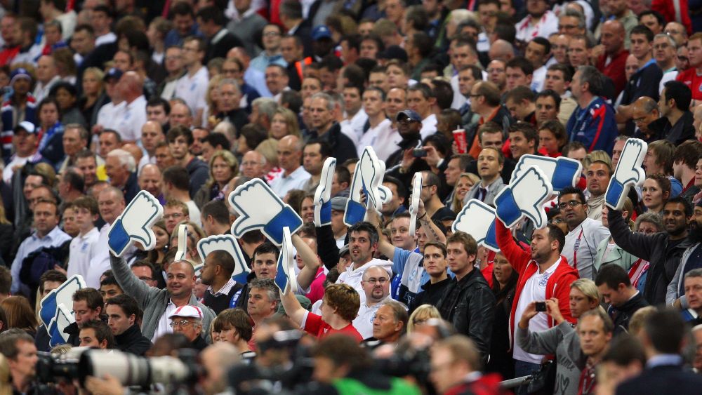EDITORIAL USE ONLYMandatory Credit: Photo by Marc Atkins/Shutterstock (8472083ag)Fans Hold Up Giant Facebook Style Thumbs Turned Down As Certain Sections of the Crowd Boo the National Anthems United Kingdom LondonEngland V Wales - 06 Sep 2011