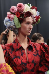 "Overall it's very summery, quite a strong woman," said Laurent Philippon, who led hair for Bumble and bumble. There were several looks Ñ one was slicked away from the face and dried with the Dyson into place, though the hair was still meant to look wet. "I'm leaving it kind of crispy, so it's not dry looking," he added. Five models had fresh flowers sculpted on top of their heads. Ñ Allison Collins