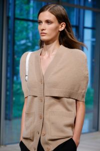 At Tibi, Frank Rizzieri used Aveda products to create a partially slicked-back look that highlighted the models' natural hair textures. "It had to do a lot with the fabrics that AmyÕs using. Some were matte and some were shiny and she wanted that reflected into the hair," he said. Ñ Alexa Tietjen
