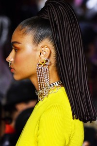 For hair, Jawara Wauchope created high ponytails with extensions made from a synthetic tubing material. The resulting lengths had a very Janice from "The Muppets" feel, but cooler, especially when Wauchope cut them into blunt ponytails. Ñ Allison Collins