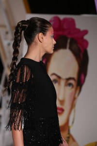 The hair look Ñ a medium-high braided ponytail crafted by Odile Gilbert for TRESemm and Dyson Ñ was inspired by Gigi Hadid. It took a lot of hairspray and a lot of blow drying to create the "very clean, long braid," Gilbert said. "For me, at the end when I finish the hair, I spray with hairspray and it's a bit like cooking [I diffuse the hair]Éno frizz, just to bring the shine," Gilbert continued. Ñ Allison Collins