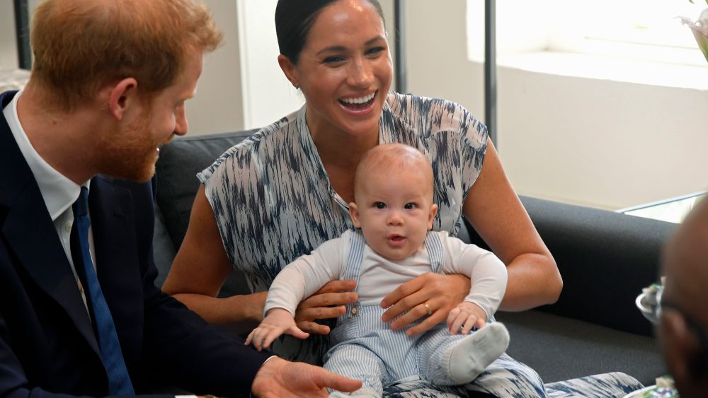 Prince Harry and Meghan Duchess of Sussex, holding their son Archie Harrison Mountbatten-Windsor at the Desmond & Leah Tutu Legacy Foundation in Cape Town, South Africa