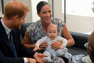 Prince Harry and Meghan Duchess of Sussex, holding their son Archie Harrison Mountbatten-Windsor at the Desmond & Leah Tutu Legacy Foundation in Cape Town, South Africa