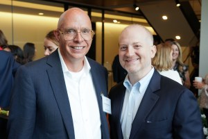 Tom Mendenhall of Ralph Lauren and Joshua Schulman, right, CEO and brand president of Coach, at Tapestry’s New York headquarters.