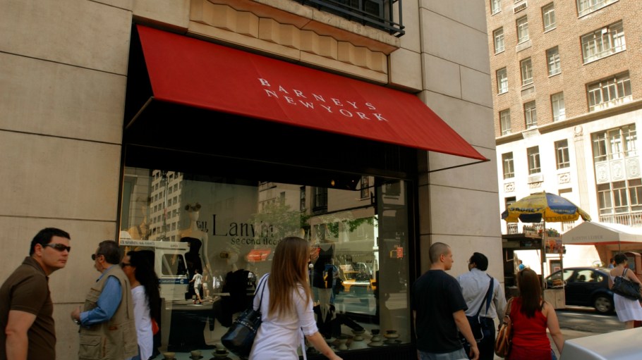 Authentic Brands is preparing a $270 million bid for Barneys, which could be reborn as shop-in-shops inside some Saks Fifth Avenue stores.