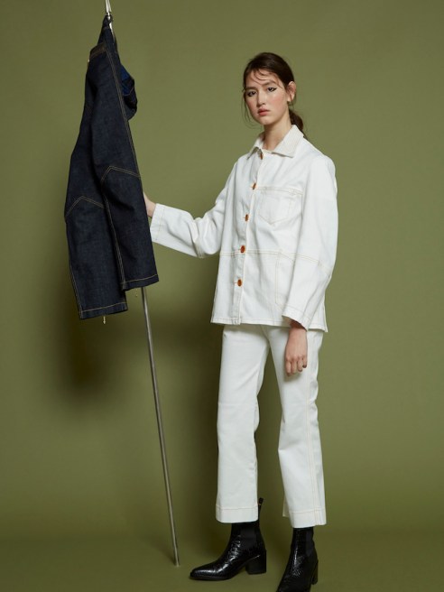 Outland Denim and Karen Walker teamed on a six-piece capsule collection that reimagines workwear pieces for modern aesthetics.