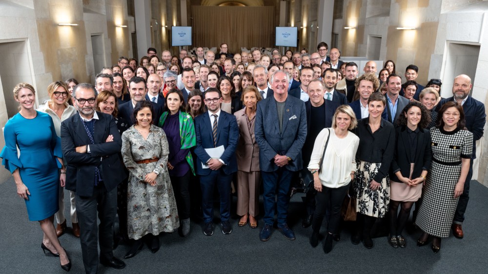 Representatives of the Fashion Pact signatories at a working meeting in Paris.