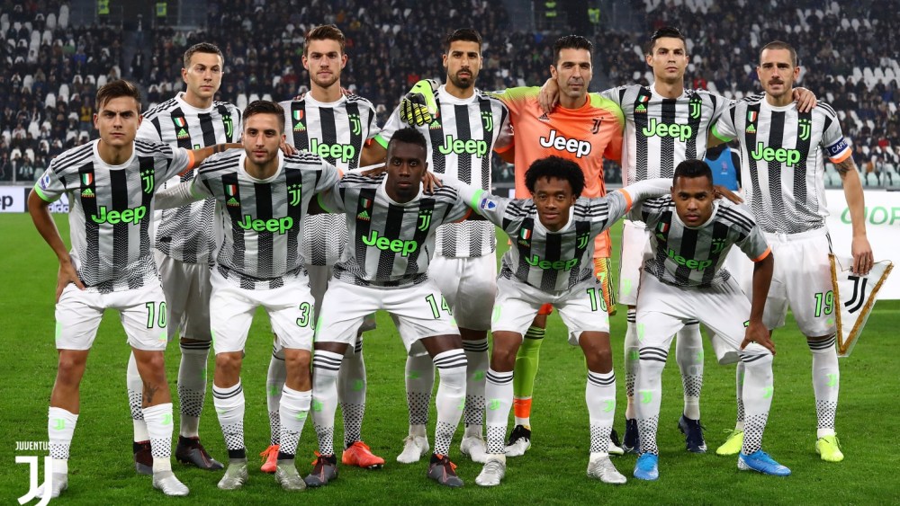 The Juventus soccer team sporting jerseys branded by Palace Skateboards and Adidas in Genoa.