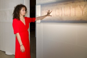 Chlo Bensahel with her tapestry, which emits lights and sounds when touched