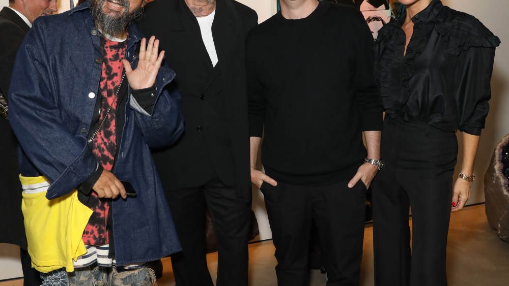 (L-R) Takashi Murakami, David Beckham, Brian Donnelly aka Kaws and Victoria Beckham attend Victoria Beckham and Sotheby's celebration of Andy Warhol with Don Julio 1942 at her Dover Street store.