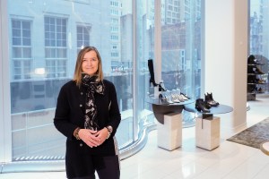 Dawn Clark by the undulating glass facade at the Nordstrom 57th Street flagship.