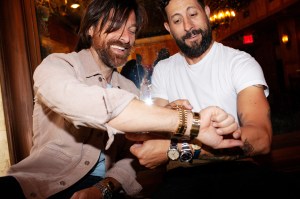 Geoff Sprung and Matthew Ramsey of Old Dominion compare watches.