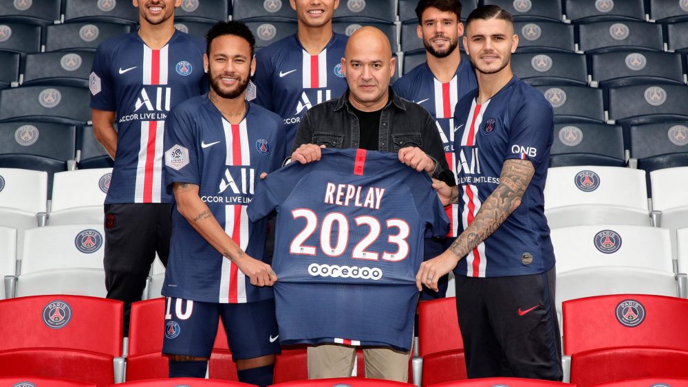 Replay's ceo Matteo Sinigaglia with part of Paris Saint-Germain soccer team.