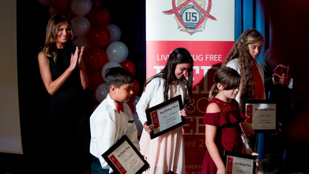 First lady Melania Trump, left, applauds art student awardees at a Red Ribbon Rally at the Drug Enforcement Agency in Arlington, VaMelania Trump, Arlington, USA - 07 Oct 2019