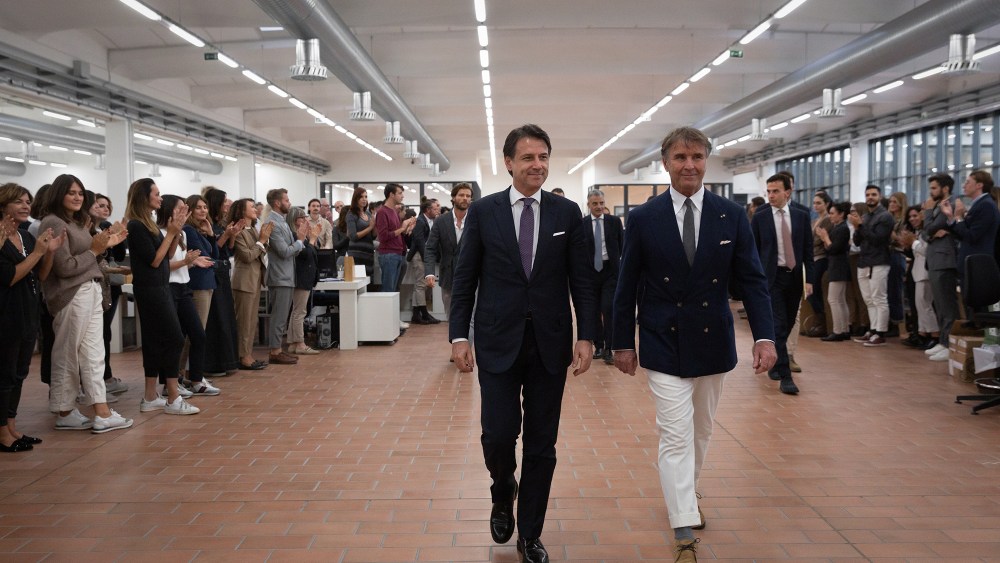 Italy's Prime Minister Giuseppe Conte and Brunello Cucinelli at the company's headquarters in Solomeo.