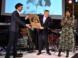 Shawn Levy, Ted Sarandos and Nicole Avant