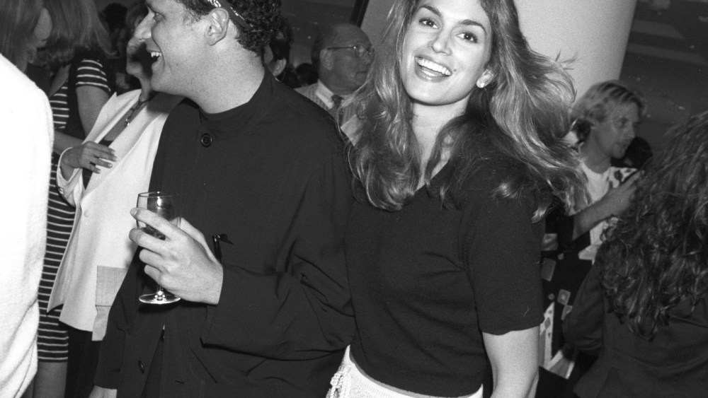 Cindy Crawford and Isaac Mizrahi at the post-premiere party for "Unzipped" inside the Beverly Hills Barneys New York store, 1995.