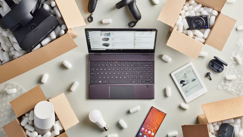 Editorial Use onlyMandatory Credit: Photo by Neil Godwin/Future/Shutterstock (10444724n)A Group Of Black Friday Online Shopping Purchases Photographed In Delivery Boxes Filled With Polystyrene Packing PelletsApple Watch Series 5 - 20 Sep 2019
