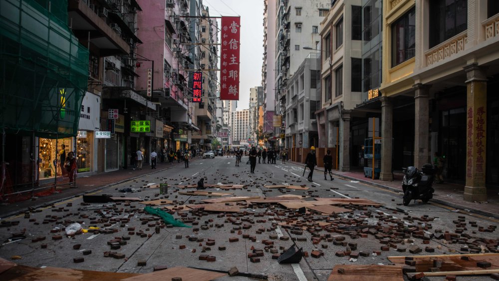A street in Mong Kok is blocked with wooden boards, trash and bricks during the protest Protests in Hong Kong