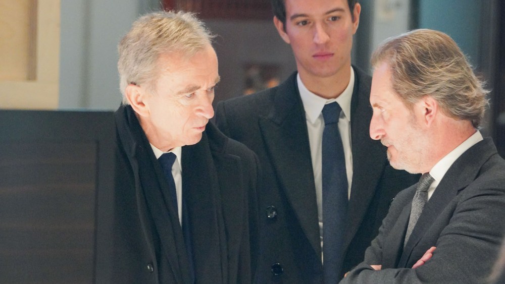 Bernard Arnault Alexandre Arnault Alessandro Bogliolo talking at Tiffany store.