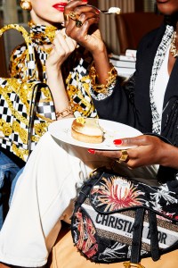 Left: BalenciagaÕs bag and silk top and cotton jeans. Gucci earring; Adore Adorn bracelet; Katkim ring.Right: Christian DiorÕs bag. Act N.1 acetate and viscose blazer with ostrich feathers over LÕAgence cotton and nylon blazer; Dries van Noten cotton tank and cotton jeans; Laruicci bracelet (worn throughout); Foundrae ring; Gucci ring, and Jennifer Fisher rings.