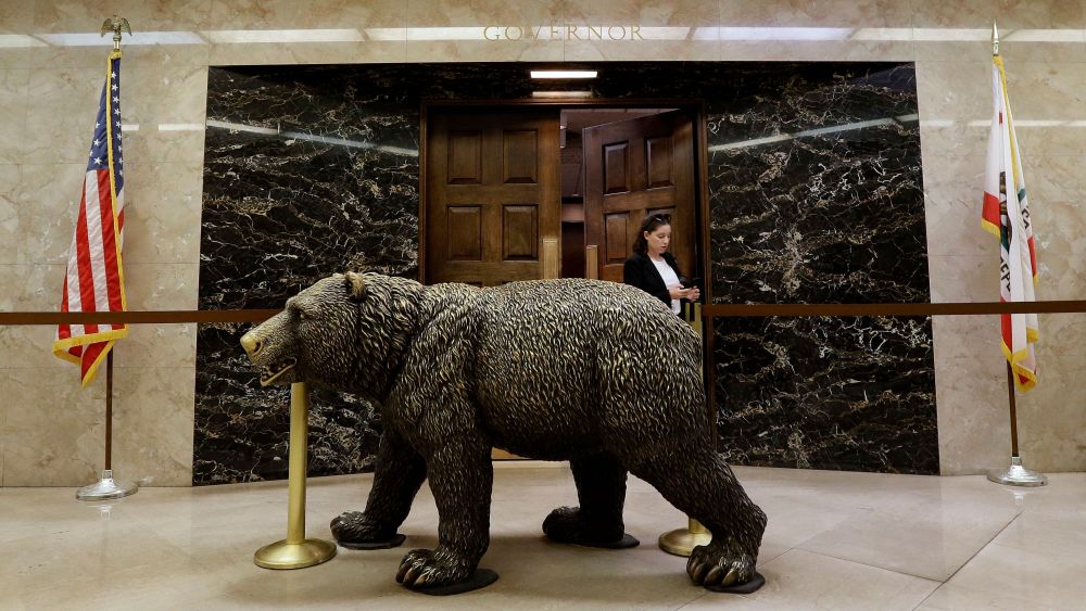 A bronze statue of a bear sits outside the governor's office in the office building attached to the Capitol, in Sacramento, Calif. Lawmakers approved a $755 million plan Thursday to rebuild the statehouse annex that houses the governor's office and most legislative officesCalifornia Budget Lawmakers Offices, Sacramento, USA - 14 Jun 2018