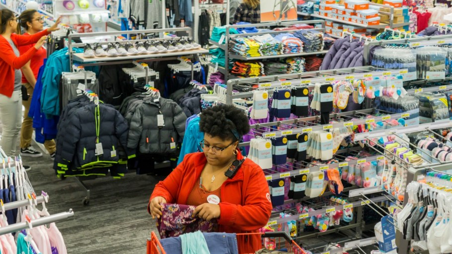 Target lowers fourth-quarter comp estimates following a rare holiday sales miss, despite signs of gains in its private label apparel.