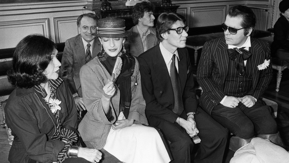 The Paris Big League Fashionmakers: Anne-Marie Munoz of YSL, Lou Lou Klossowski, Yves St. Laurent and Karl Lagerfeld in front, Pierre Berge and Thadee Klossowski behind