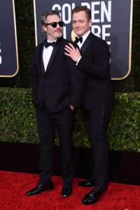 Joaquin Phoenix in Stella McCartney and Taron Egerton, Golden Globes 2020