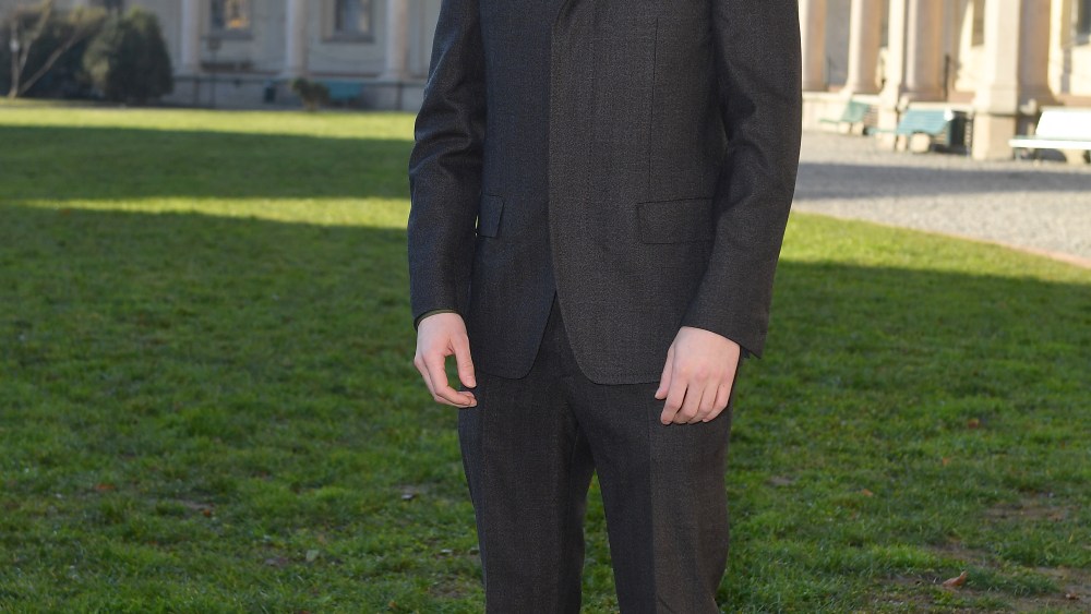 Hero Fiennes-Tiffin attending the Salvatore Ferragamo show.