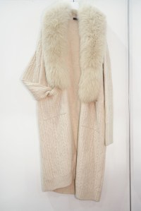 A multi-gauge cashmere cardigan with detachable hood from Calla Box.