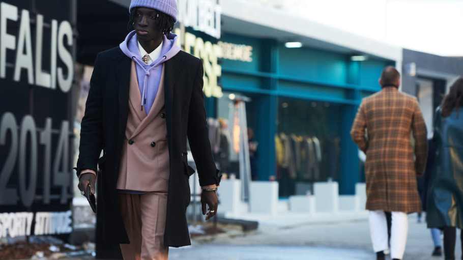Florence street style looks celebrate traditional menswear with gender-neutral accessories at Pitti Immagine Uomo's 97th edition.