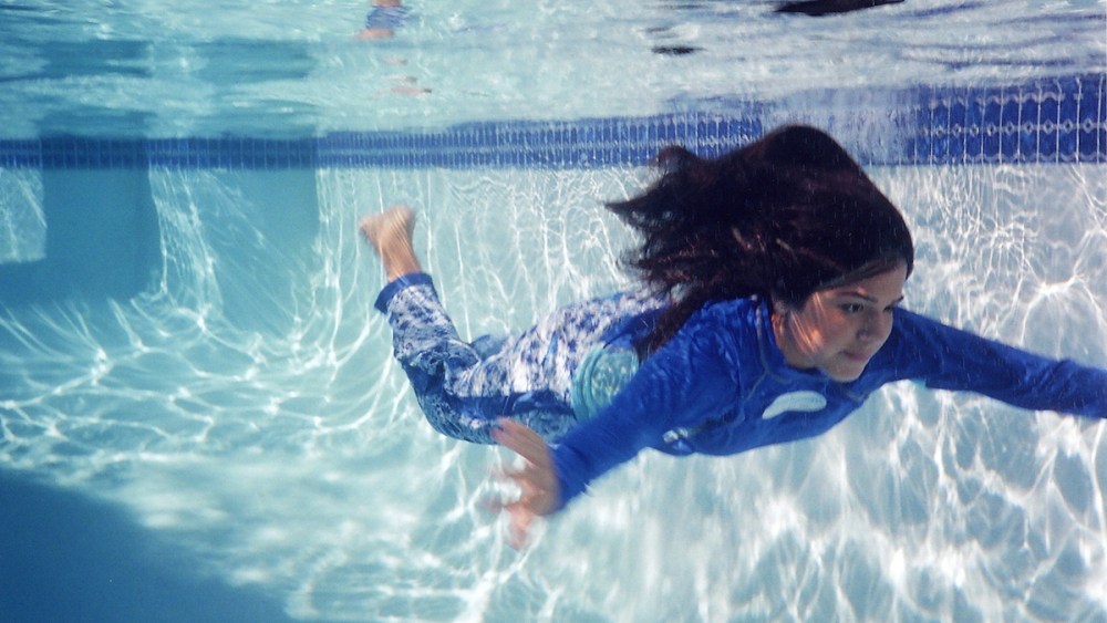 Shereen Sabet (b. Egypt, 1970) for Splashgear, LLC (est. United States, 2005), Ensemble (shirt, pants, and swimhood); Hawaiian Colorway Collection, 2006, Polyester knit; Courtesy of Splashgear, LLC