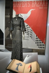A Jeanne Lanvin dress in front of a cover by Ert.