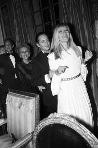 Oscar de la Renta, Alexis de Rede and Betty Catroux for a cha-cha line while dancing at the De Rede Party held at Versailles Palace, 1973.