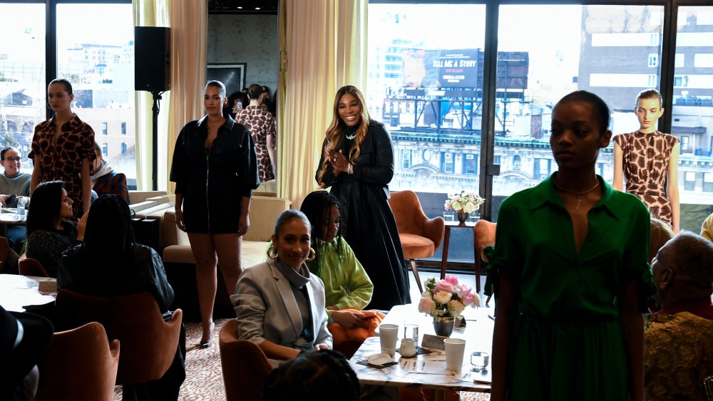 Serena Williams with models standing in her spring collection.